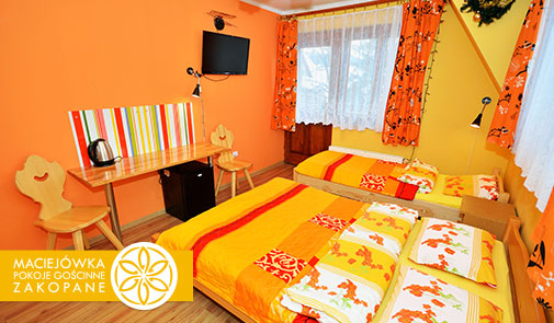 Interior of a triple room in Maciejowka Guesthouse